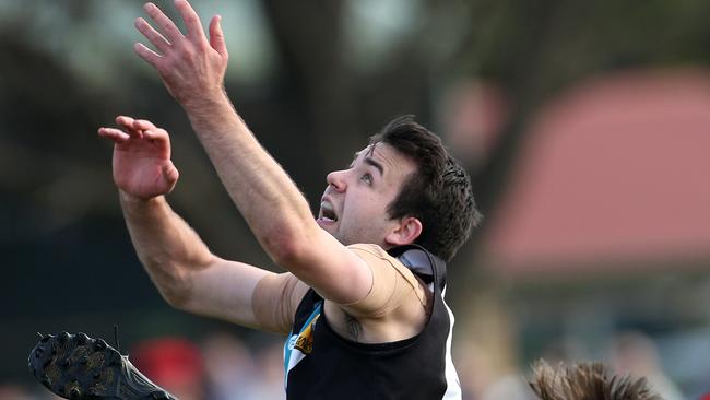 Jacob Yeomans marks for St Mary's. Picture: Hamish Blair