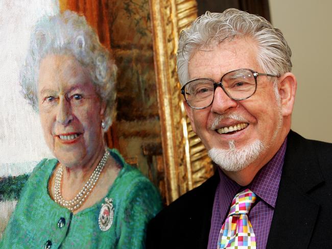 Disgraced entertainer Rolf Harris with his 2005 portrait of Queen Elizabeth II.