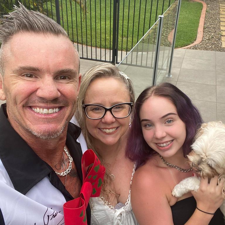 Coast fitness trainer Leon Stensholm is all smiles on Christmas Day with wife Renee, daughter Indiana and little Bailey.