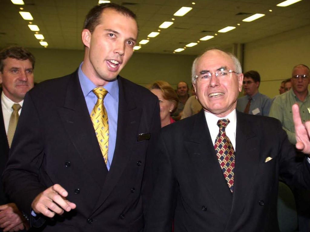 Peter Dutton with former prime minister John Howard on the campaign trail in 2001.