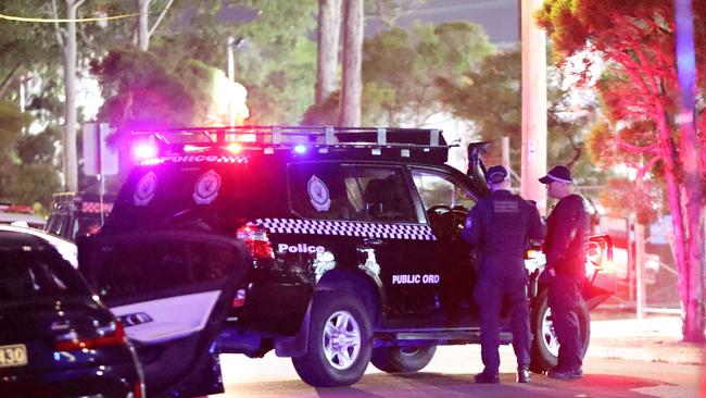 Police at the crime scene in Granville where a man was shot dead on Sunday. Picture: Damian Shaw