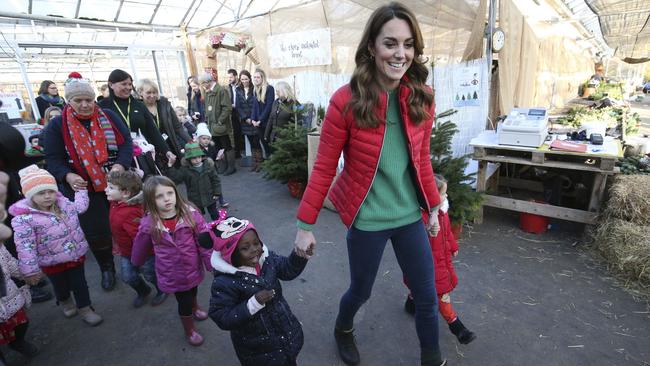 The Duchess of Cambridge with children at the Family Action event. Picture: Jonathan Brady/AP