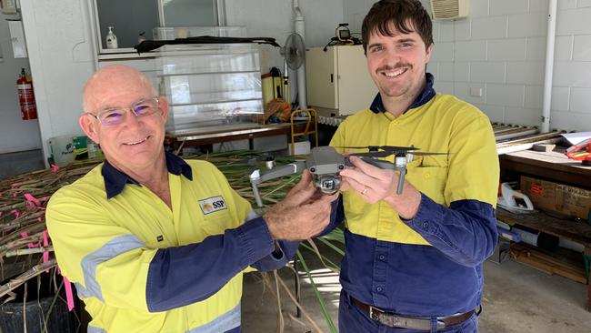 Once the drone is programmed to do its mapping, there's not a whole lot of work for Frank and Todd of Sugar Services Proserpine to do out in the field – "We just stand there and make sure it doesn't crash!" said Frank. Picture: Kirra Grimes