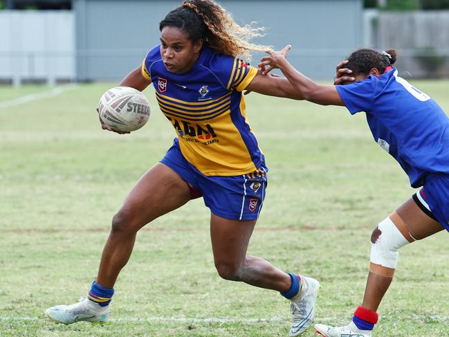 Kangaroos captain Genavie Tabuai pushes past the Maidens' defence to score a try in the Far North Queensland Rugby League (FNQRL) Women's preliminary final match between the Cairns Kangaroos and the Ivanhoe Maidens at Jones Park. Picture: Brendan Radke