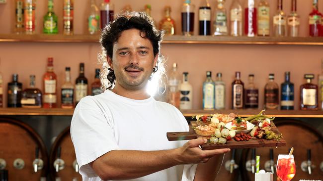 Oli Frost promoting his Lucia Tapas Lounge in Tugun. Picture: Adam Head