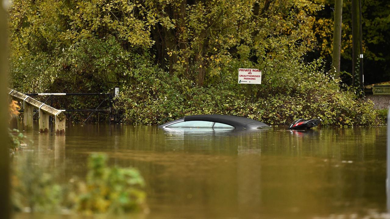 Britain savaged by fatal floods: woman dies, thousands flee | news.com ...