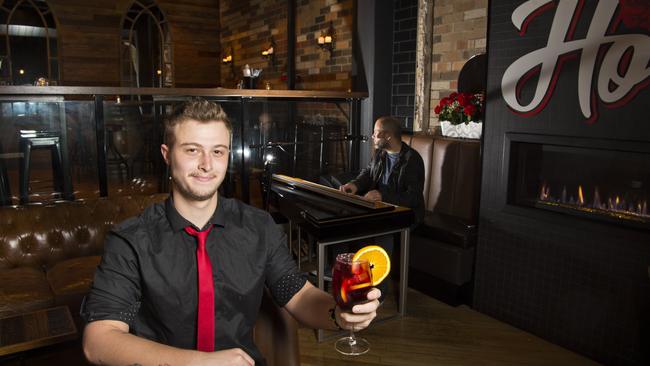 Hola staff member Jordan Kucks (front) and pianist Peter Woods are ready to open the Spanish-style tapas and piano bar in the Walton Stores precinct, Tuesday, October 15, 2019. Picture: Kevin Farmer