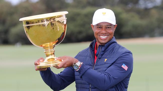 Tiger Woods holds the Presidents Cup aloft at Royal Melbourne Golf Club in 2019. Picture: Michael Klein