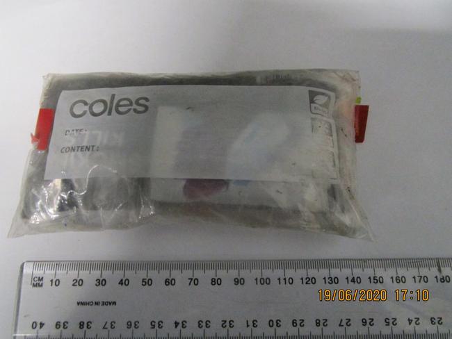 Prison officers find this package in the museum garden at Cooma Jail. Picture: Corrective Services NSW