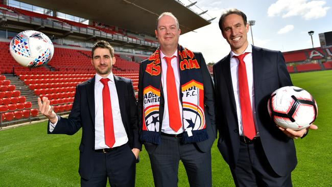 Chief executive Nathan Kosmina (left) with Adelaide United chairman Piet van der Pol and former director of football Aurelio Vidmar. Picture: AAP Image/David Mariuz