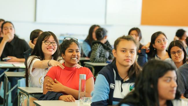 Wenquing Zhuang and Pumudi Abeywardarna as Darwin High School seniors finish the first of their 2019 exams. The Department of Education is working to ensure 2020s Year 12s can finish their studies this year despite the coronavirus pandemic. Picture: Glenn Campbell