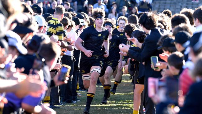 St Laurence’s captain Jake Kurbatoff leads his team on. Picture, John Gass