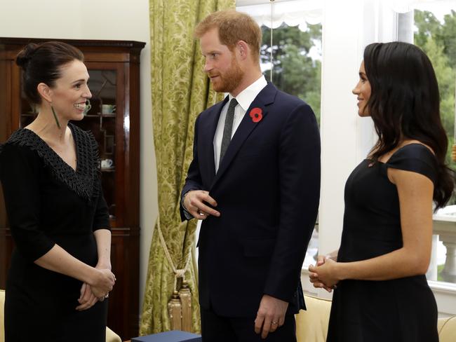 The royals chat to New Zealand Prime Minister Jacinda Ardern at Government House before Meghan’s speech. Picture: Getty Images