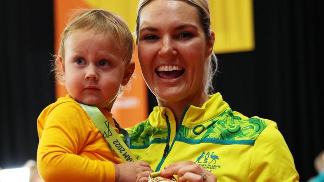 Gretel Bueta of Team Australia poses for a photo with their son Bobby during the Netball Medal Ceremony on day ten of the Birmingham 2022 Commonwealth Games. Photo: Getty Images