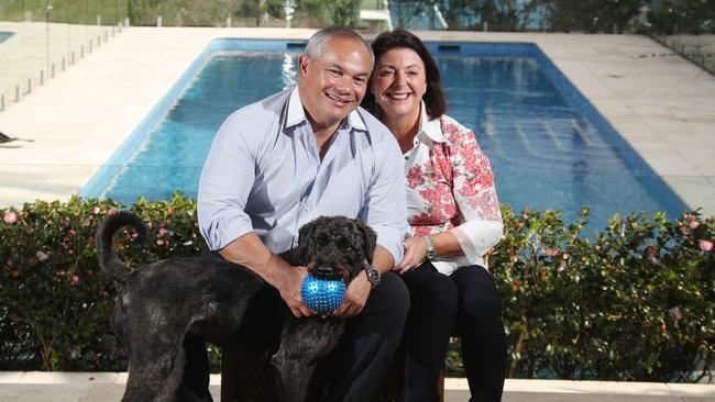 Tom Tate at his Gold Coast home with his wife Ruth and their dog Maddie after deciding he'll run again for Mayor at the next election. Picture: Glenn Hampson