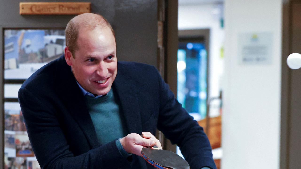 Britain's Prince William, Duke of Cambridge plays table tennis during his visit to CATCH, a youth-led charity in Leeds, northern England on November 30, 2021. (Photo by PHIL NOBLE / POOL / AFP)