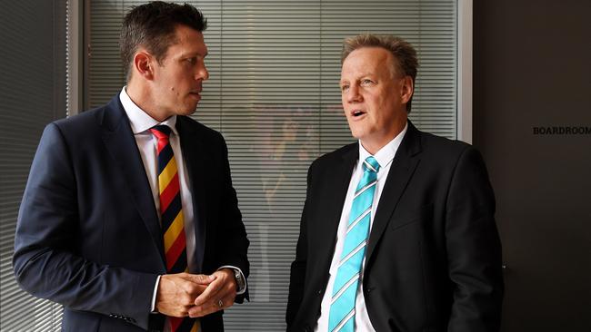 Adelaide Football Club CEO Andrew Fagan with Port Adelaide Football Club CEO Keith Thomas. Picture: AAP Image/Tracey Nearmy