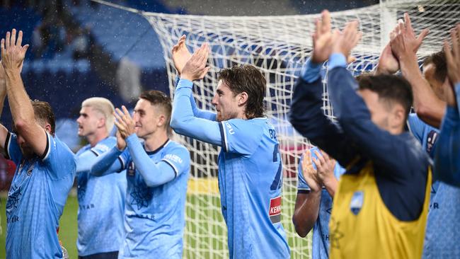 Sydney FC players thank their fans after beating the Jets. Picture: Brett Hemmings/Getty Images