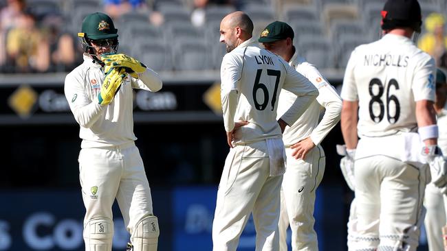 Tim Paine of Australia successfully calls for a DRS Challenge for LBW on Tom Latham of New Zealand during day 4 of the first Test match between Australia and New Zealand at Optus Stadium in Perth, Sunday, December 15, 2019. (AAP Image/Richard Wainwright) NO ARCHIVING, EDITORIAL USE ONLY, IMAGES TO BE USED FOR NEWS REPORTING PURPOSES ONLY, NO COMMERCIAL USE WHATSOEVER, NO USE IN BOOKS WITHOUT PRIOR WRITTEN CONSENT FROM AAP