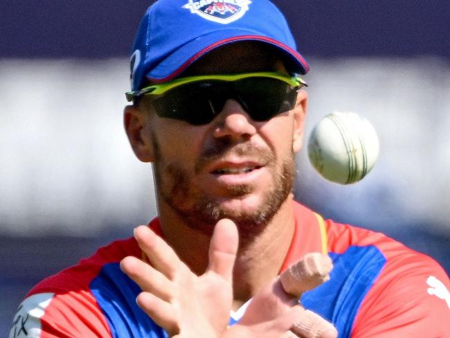 Delhi Capitals' David Warner fields the ball during the Indian Premier League (IPL) Twenty20 cricket match between Mumbai Indians and Delhi Capitals at the Wankhade Stadium in Mumbai on April 7, 2024. (Photo by INDRANIL MUKHERJEE / AFP) / -- IMAGE RESTRICTED TO EDITORIAL USE - STRICTLY NO COMMERCIAL USE --