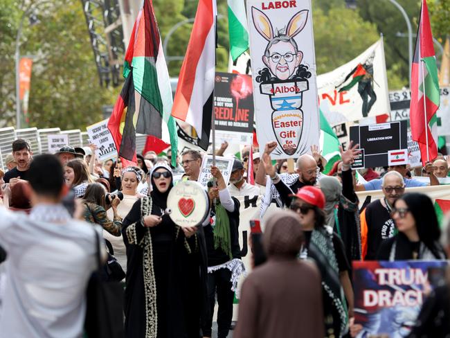 SYDNEY, AUSTRALIA - NewsWire Photos APRIL 6, 2025: People march in the streets of Bankstown at the Teachers & School Staff for Palestine rally at Paul Keating Park in Bankstown. Picture: NewsWire / Damian Shaw