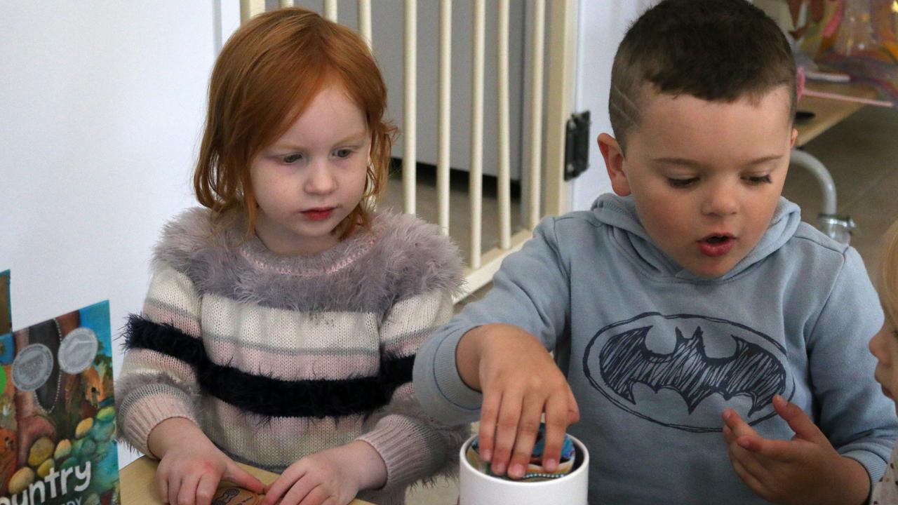 Cooper and Rosalie doing an activity with Jacinta.