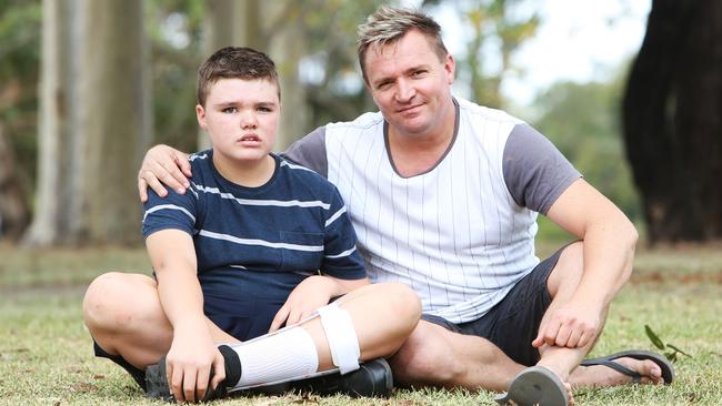 Layton Smith and his dad Troy remain in a legal battle over injuries to Layton caused in a car crash when he was two. Picture: Tim Hunter