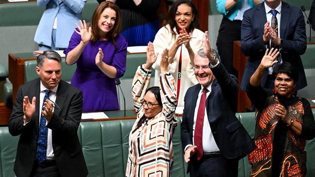 Indigenous Australians Minister Linda Burney, centre, with Attorney-General Mark Dreyfus, and Marion Scrymgour, right, after the voice bill is introduced. Picture: AAP