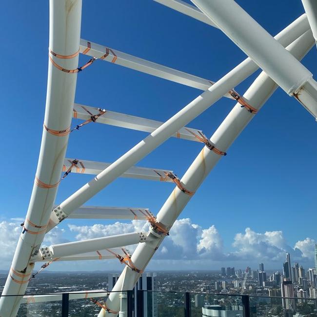 Ratchet straps covering a structure on top of The Oracle Hinterland Tower at Broadbeach. Photo: Supplied