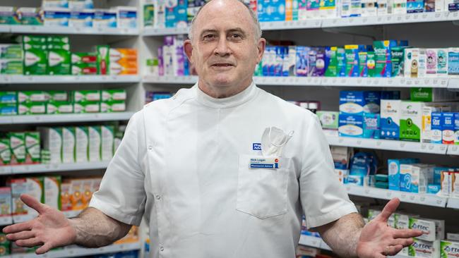 Nick Logan, pictured at his pharmacy in Artarmon, is getting phone calls every couple of minutes from people wanting RATs. Picture: Julian Andrews