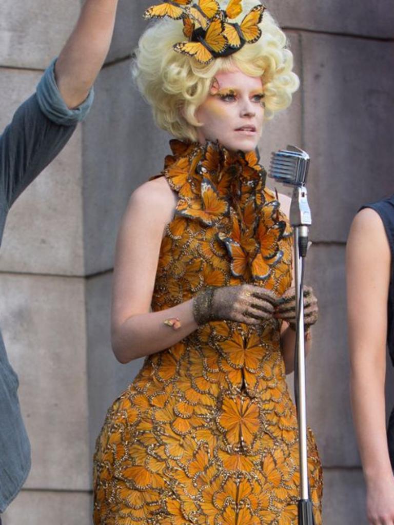 While there is no disclosed information regarding Elle Fanning's expected salary, Elizabeth Banks earned between $10 and $20 million playing Effie in Catching Fire, and so considering Fanning's established career, her compensation is expected to be competitive. Picture: Supplied