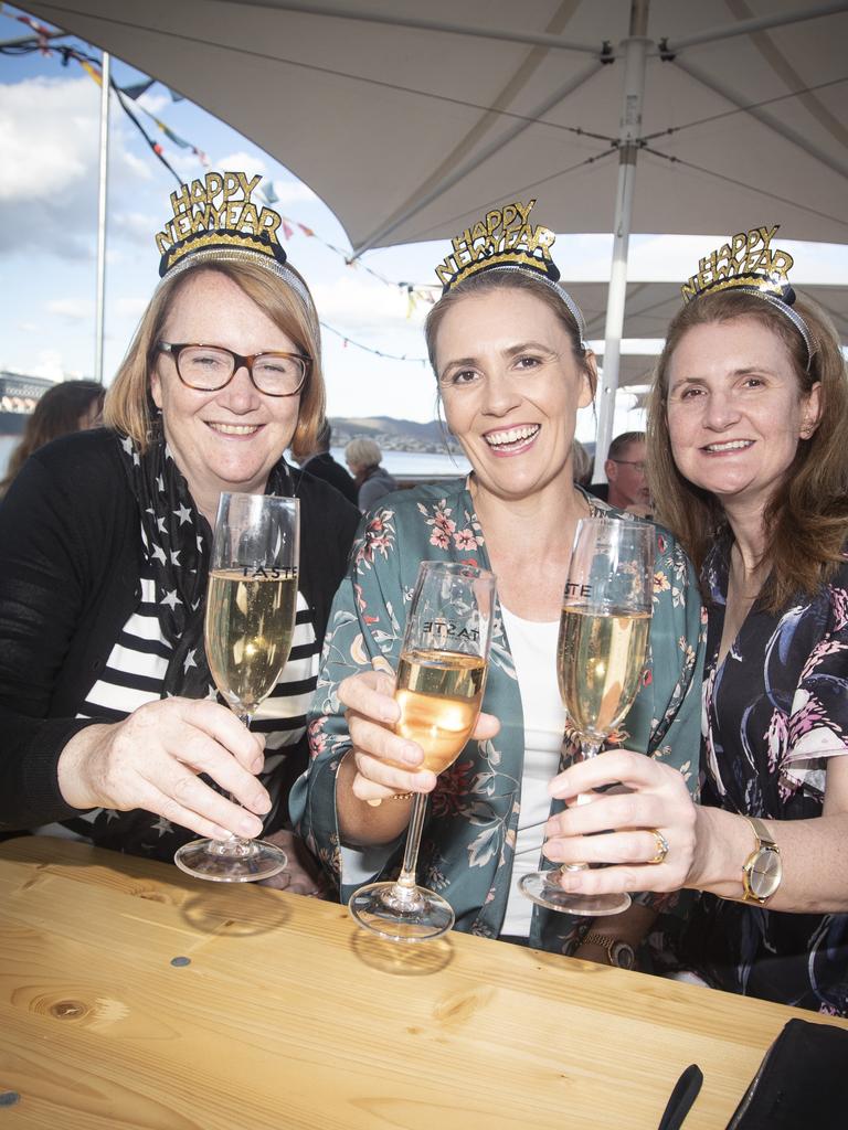 Bernadette Schramm, Elizabeth Walker and Belinda Schramm enjoying the NYE party at the 2019 Taste of Tasmania. Picture: LUKE BOWDEN