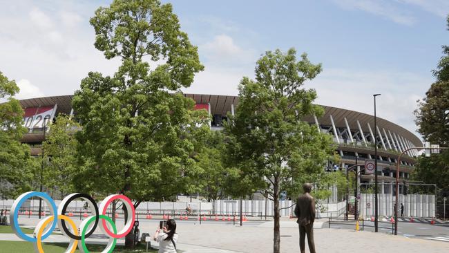 The five-ring Olympic emblem in front of the National Stadium. Picture: AFP