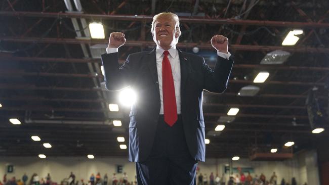 President Donald Trump reacts to the cheering crowd as he leaves a rally at the Four Seasons Arena at Montana ExpoPark, Thursday, July 5, 2018, in Great Falls, Mont., in support of Rep. Greg Gianforte, R-Mont., and GOP Senate candidate Matt Rosendale. (AP Photo/Carolyn Kaster)