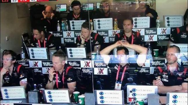 A snapshot of the Essendon coaching box at a game in 2019.