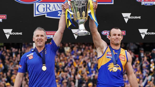 Adam Simpson and Shannon Hurn with the premiership cup on the MCG in September. Picture: Michael Dodge (Getty).