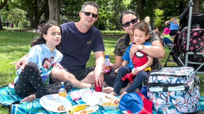 Josh and Mary Whitfield with their children Amelia, 10, and Declan, 4, enjoy an Australia Day picnic at Regatta Point in Canberra. Picture: Noah Yim