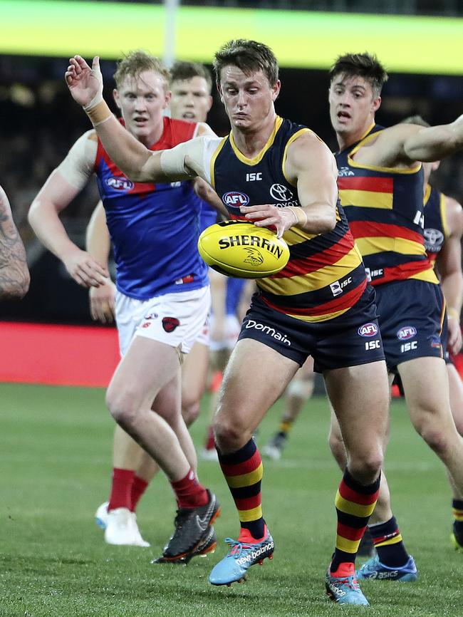 Matt Crouch gets a kick away during his 32-disposal effort. Picture SARAH REED