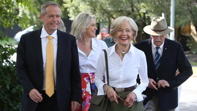 Bill Shorten with his wife Chloe and in-laws Quentin Bryce, the former governor-general, and Michael Bryce at church in Brisbane yesterday.  Picture: Kym Smith