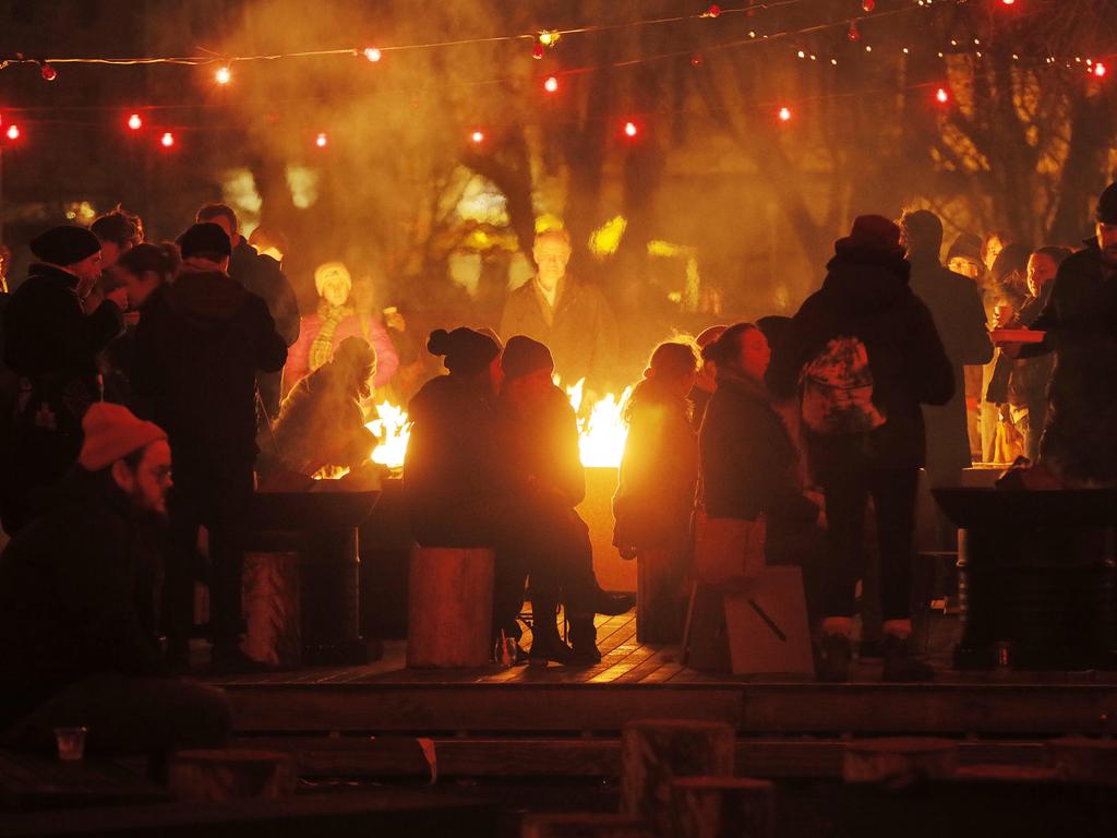 People enjoying the Dark Mofo Winter Feast. Picture: MATHEW FARRELL