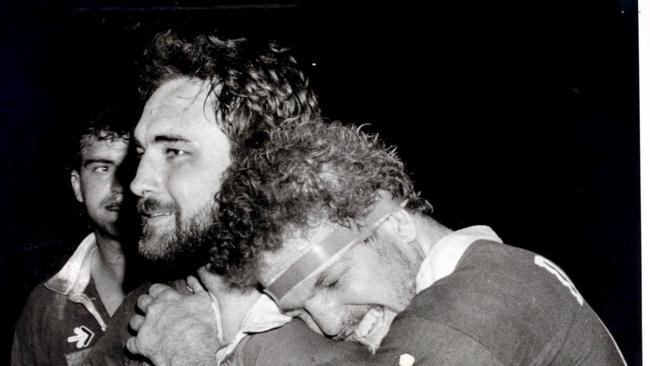 Greg Dowling hugs Bryan Niebling after Queensland’s 1987 win.