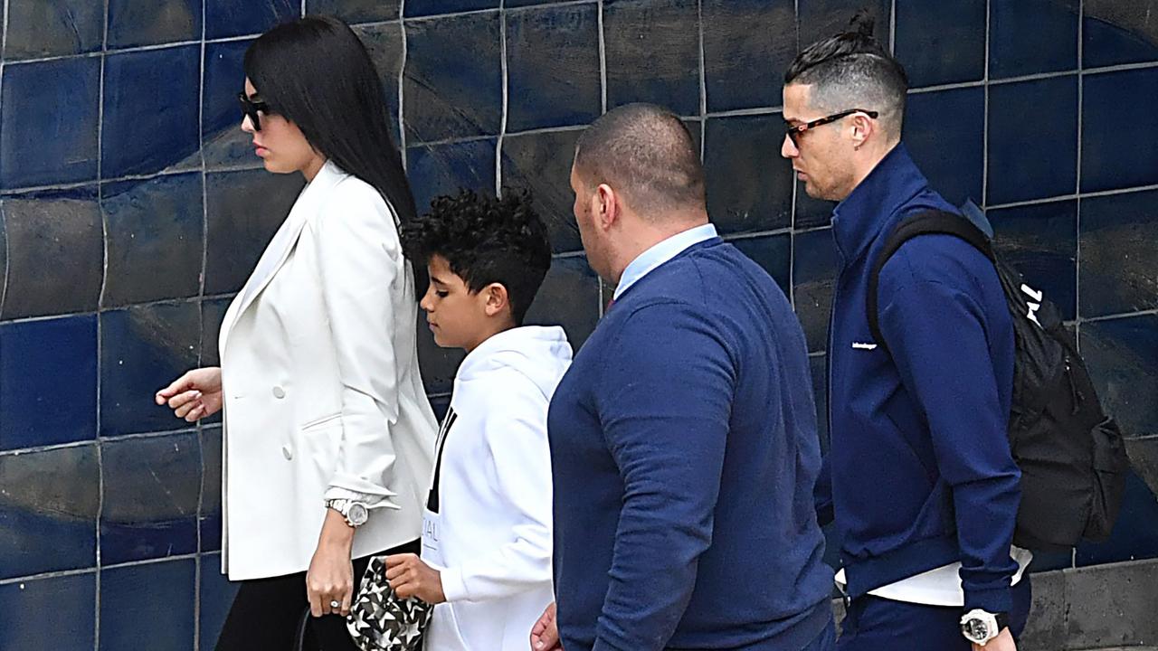 Cristiano Ronaldo (R) travelled to Madeira with his partner and son after his mother Dolores suffered a stroke.