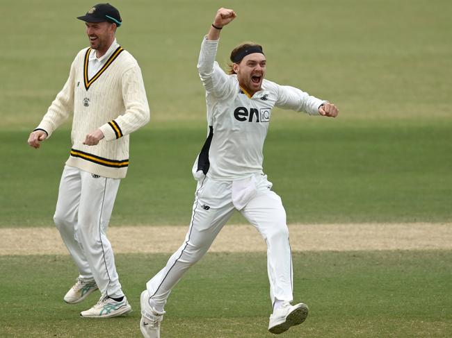 WA spinner Corey Rocchiccioli celebrates a wicket against Victoria. Picture: Quinn Rooney/Getty Images