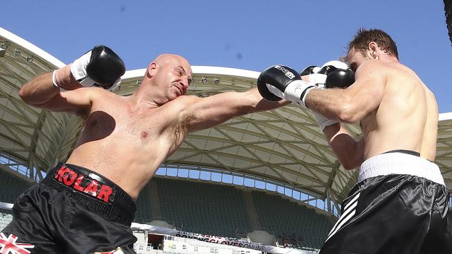 Shane Tuck takes on Ivan Kolar. Picture Sarah Reed