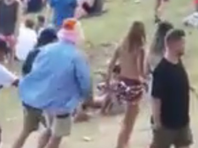 Right before the man groped the topless woman's breast.