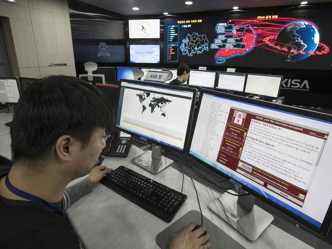 A photo taken on May 15, 2017 shows staff monitoring the spread of ransomware cyber-attacks at the Korea Internet and Security Agency (KISA) in Seoul More cyberattacks could be in the pipeline after the global havoc caused by the Wannacry ransomware, a South Korean cybersecurity expert warned May 16 as fingers pointed at the North. More than 200,000 computers in 150 countries were hit by the ransom cyberattack, described as the largest ever of its kind, over the weekend.   / AFP PHOTO / YONHAP / YONHAP / REPUBLIC OF KOREA OUT  NO ARCHIVES  RESTRICTED TO SUBSCRIPTION USE