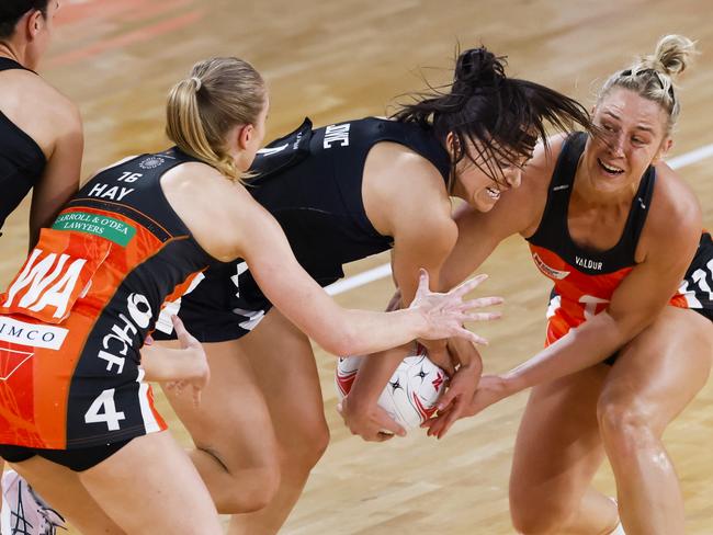 Molly Jovic of the Magpies (C) and Jamie-Lee Price of the Giants compete for the ball during the round five Super Netball match between Giants Netball and Collingwood Magpies. Picture: Getty Images