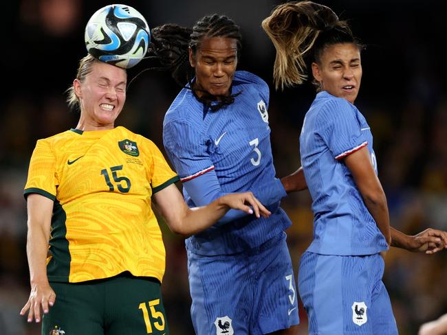 Clare Hunt heads the ball during the pre-World Cup friendly against France. Picture: Martin Keep/AFP