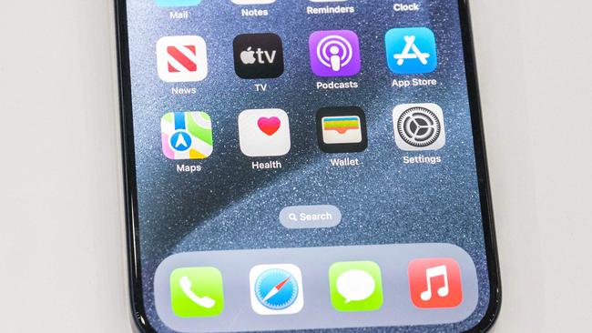 The new Apple iPhone 15 Pro models, with EU ordered USB-C charger, is displayed amongst other new products during a launch event at Apple Park in Cupertino, California, on September 12, 2023. (Photo by Nic Coury / AFP)