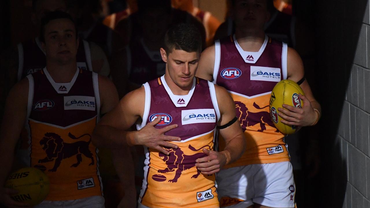 Dayne Zorko leads Brisbane out at Metricon Stadium on Saturday night.